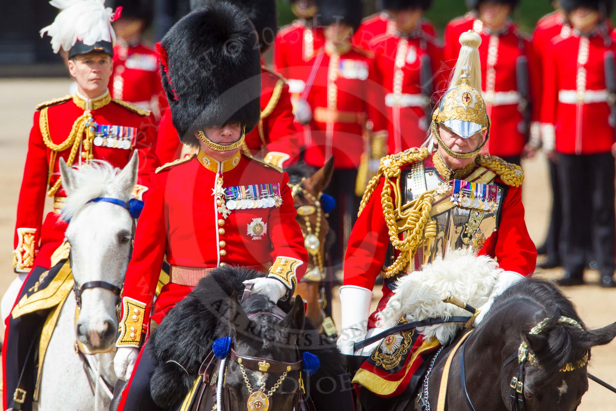 The Colonel's Review 2013: The Non-Royal Colonels, Colonel Coldstream Guards General Sir James Bucknall and Gold Stick in Waiting and Colonel Life Guards, Field Marshal the Lord Guthrie of Craigiebank in focus. Major General Commanding the Household Division and General Officer Commanding London District, Major George Norton at the back..
Horse Guards Parade, Westminster,
London SW1,

United Kingdom,
on 08 June 2013 at 11:06, image #404