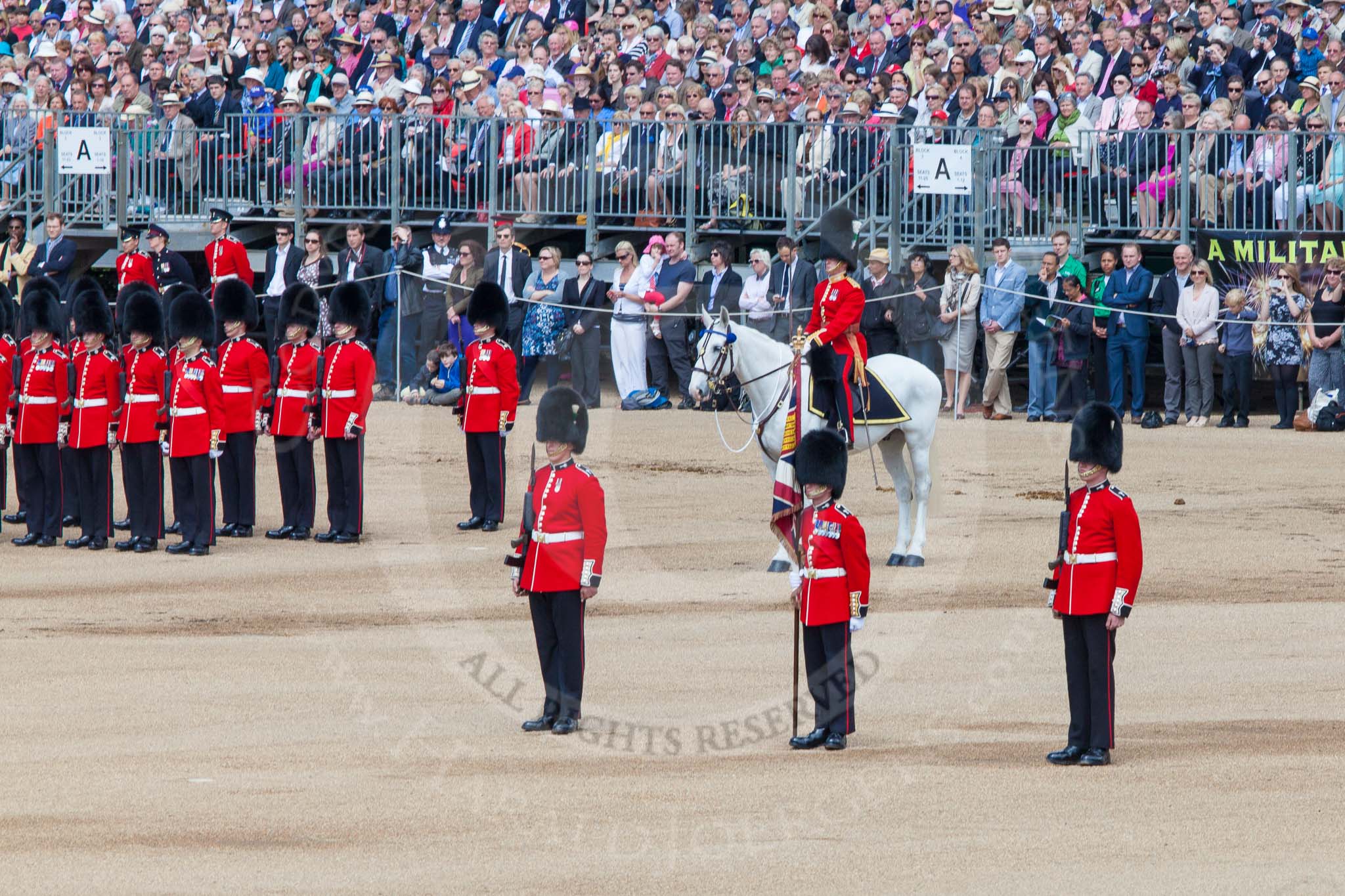 The Colonel's Review 2013: Colour Sergeant R J Heath, Welsh Guards, with the two (unfortunately unnamed) sentries..
Horse Guards Parade, Westminster,
London SW1,

United Kingdom,
on 08 June 2013 at 11:09, image #435