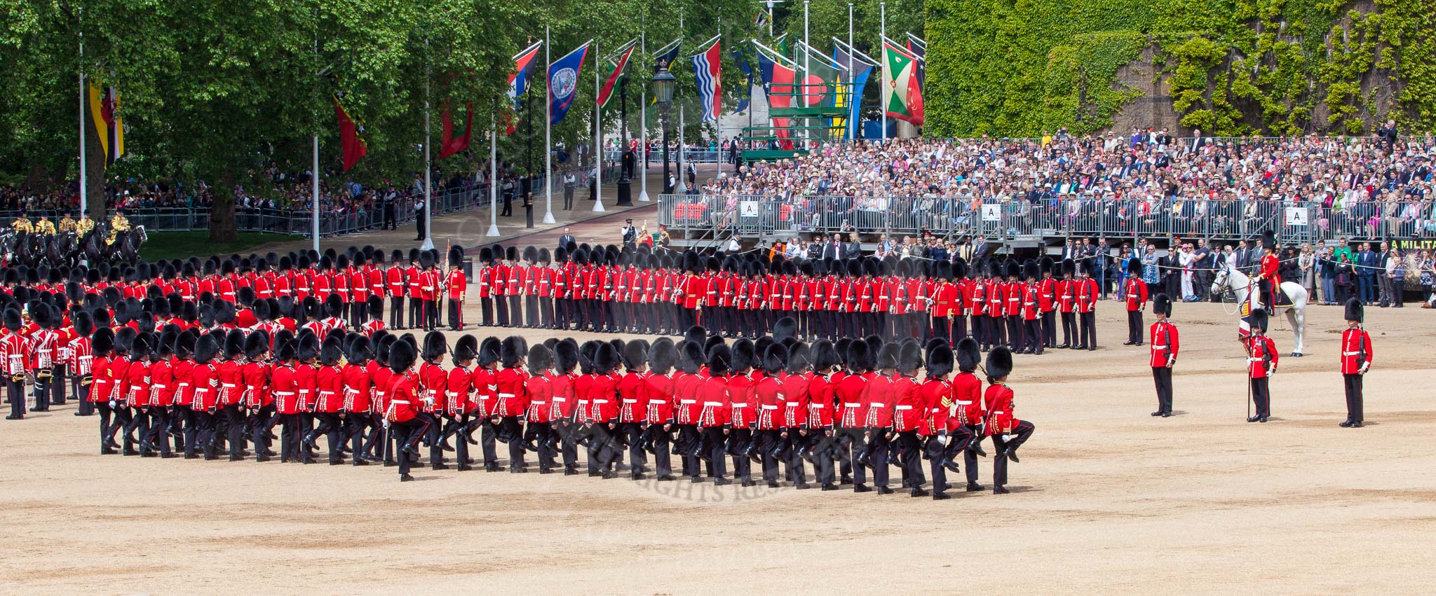 The Colonel's Review 2013: No. 1 Guard (Escort for the Colour),1st Battalion Welsh Guards is about to reveive the Colour. In front the Ensign, Second Lieutenant Joel Dinwiddle, and the Subaltern, Captain F O Lloyd-George. Behind No. 1 Guard the Regimental Sergeant Major, WO1 Martin Topps, Welsh Guards..
Horse Guards Parade, Westminster,
London SW1,

United Kingdom,
on 08 June 2013 at 11:17, image #493