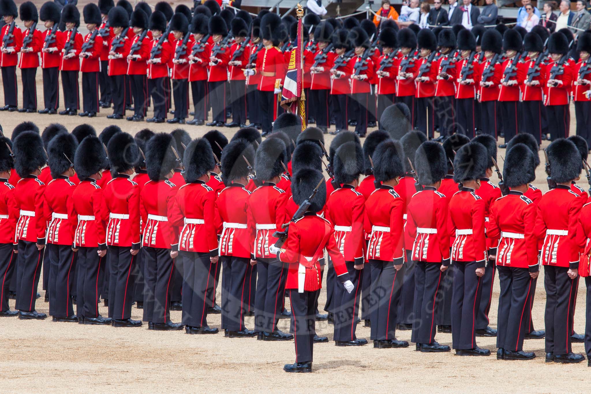 The Colonel's Review 2013: The Colour Party joins the Escort to the Colour, here Colour Sergeant, R J Heath, Welsh Guards, at the rear of the two lines of guardsmen..
Horse Guards Parade, Westminster,
London SW1,

United Kingdom,
on 08 June 2013 at 11:21, image #537