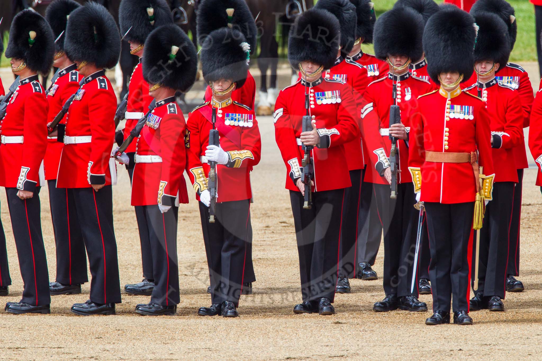 The Colonel's Review 2013: The Escort to the Colour has trooped the Colour past No. 2 Guard, 1st Battalion Welsh Guards, and is now almost back to their initial position, when they were the Escort for the Colour..
Horse Guards Parade, Westminster,
London SW1,

United Kingdom,
on 08 June 2013 at 11:26, image #584