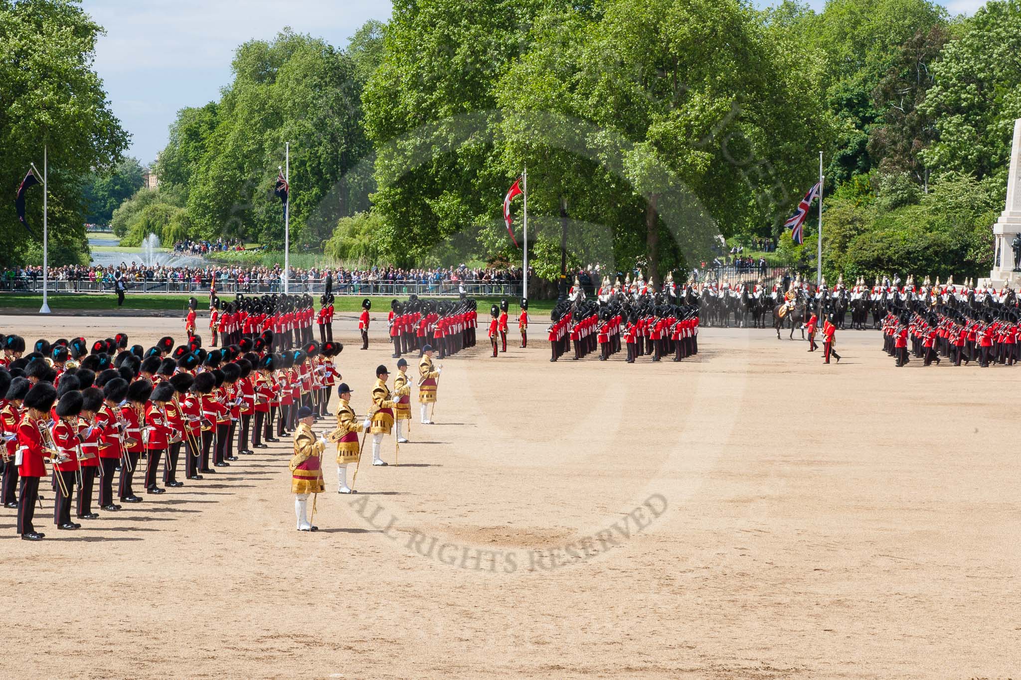 The Colonel's Review 2013: The six guards divisions have changed direction. Behind them, the Household Cavalry is leaving their position to march off..
Horse Guards Parade, Westminster,
London SW1,

United Kingdom,
on 08 June 2013 at 12:04, image #814