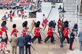 Photo 1306080954245D27815HaraldJoergens The Colonel's Review 2013: The 'Keepers of the Ground', guardsmen bearing marker flags for their respective regiments, disappearing under Horse Guards Arch, they will return later to mark the positions for their regiments..
Horse Guards Parade, Westminster,
London SW1,
United Kingdom,
on 08 June 2013 at 09:54, image #31