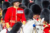 The Colonel's Review 2013: The Field Officer in Brigade Waiting, Lieutenant Colonel Dino Bossi, Welsh Guards, commanding "present arms" as the Escort to the Colour is starting the trooping of the Colour through the ranks..
Horse Guards Parade, Westminster,
London SW1,

United Kingdom,
on 08 June 2013 at 11:23, image #552