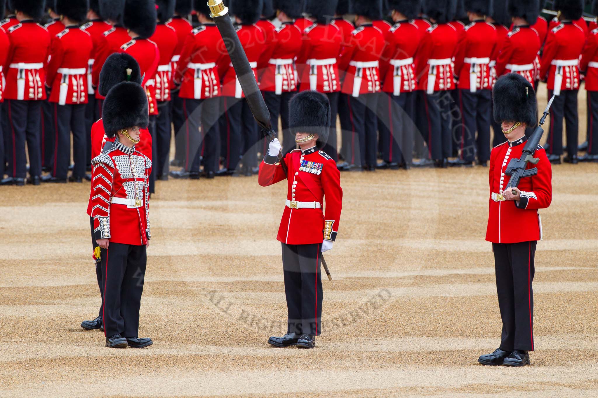 Major General's Review 2013: Welsh Guards Drummer approaching Colour Sergeant R J Heath, Welsh Guards, carrying the Colour and the two sentries..
Horse Guards Parade, Westminster,
London SW1,

United Kingdom,
on 01 June 2013 at 10:32, image #122