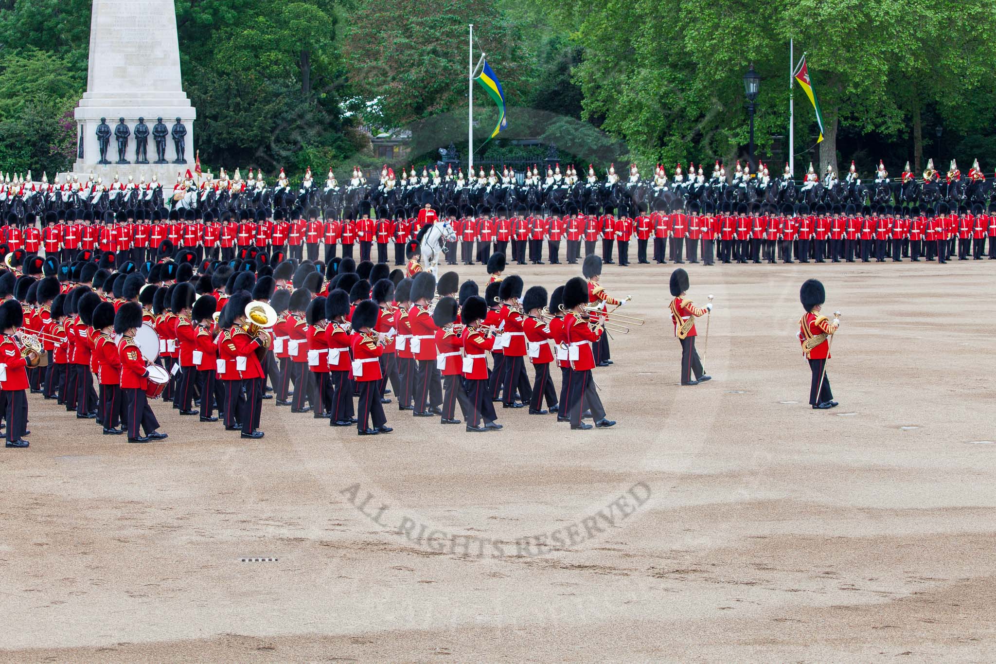 Major General's Review 2013: The Massed Band Troop begins with the slow march - the Waltz from Les Huguenots. The Field Officer, and behind him the Third and Fourth Division of the Sovereign's Escort, The Blues and Royals, can be seen on top of the image..
Horse Guards Parade, Westminster,
London SW1,

United Kingdom,
on 01 June 2013 at 11:08, image #318