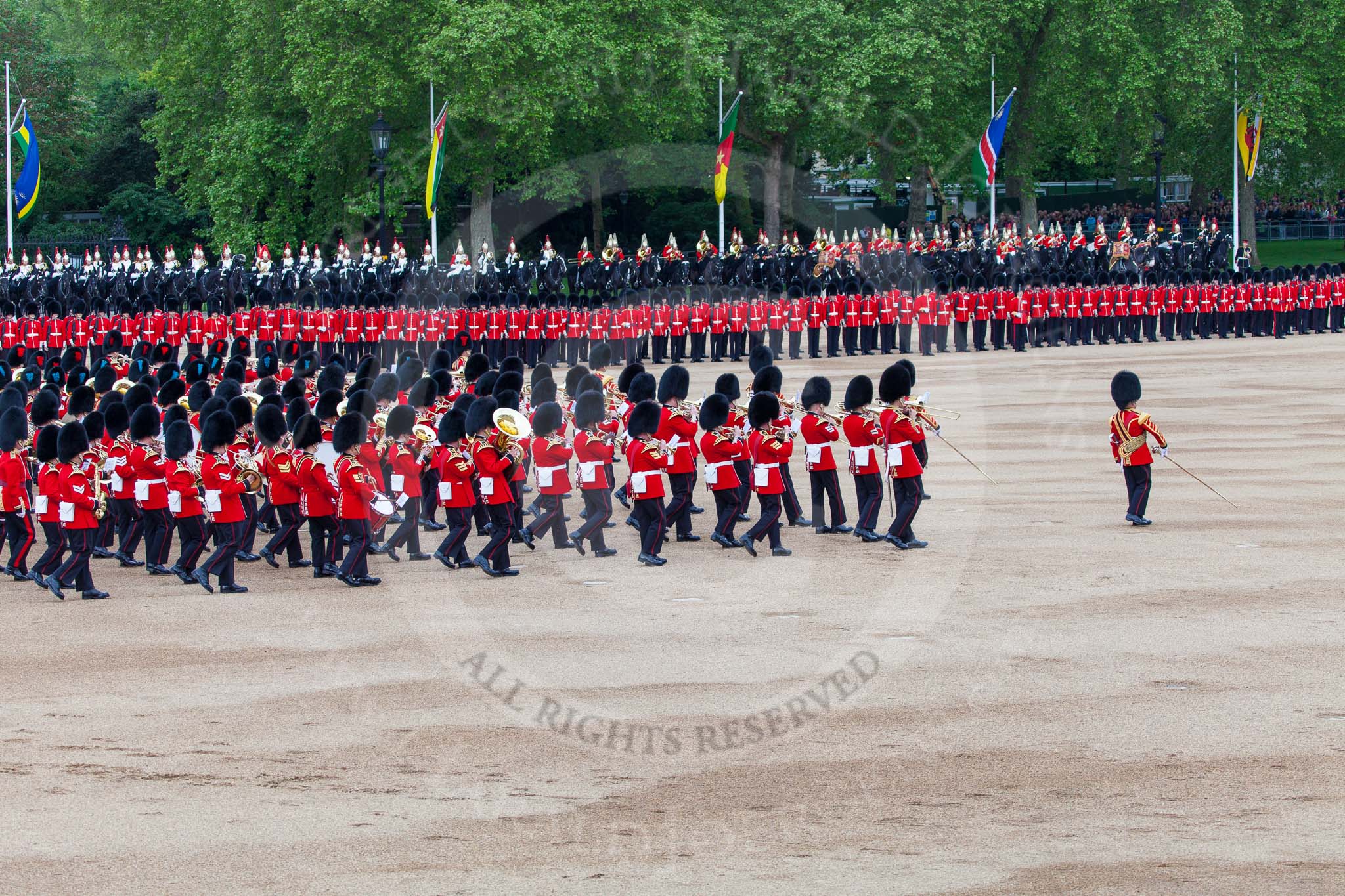 Major General's Review 2013: The Massed Band Troop begins with the slow march - the Waltz from Les Huguenots. The Field Officer, and behind him the Third and Fourth Division of the Sovereign's Escort, The Blues and Royals, can be seen on top of the image..
Horse Guards Parade, Westminster,
London SW1,

United Kingdom,
on 01 June 2013 at 11:08, image #320