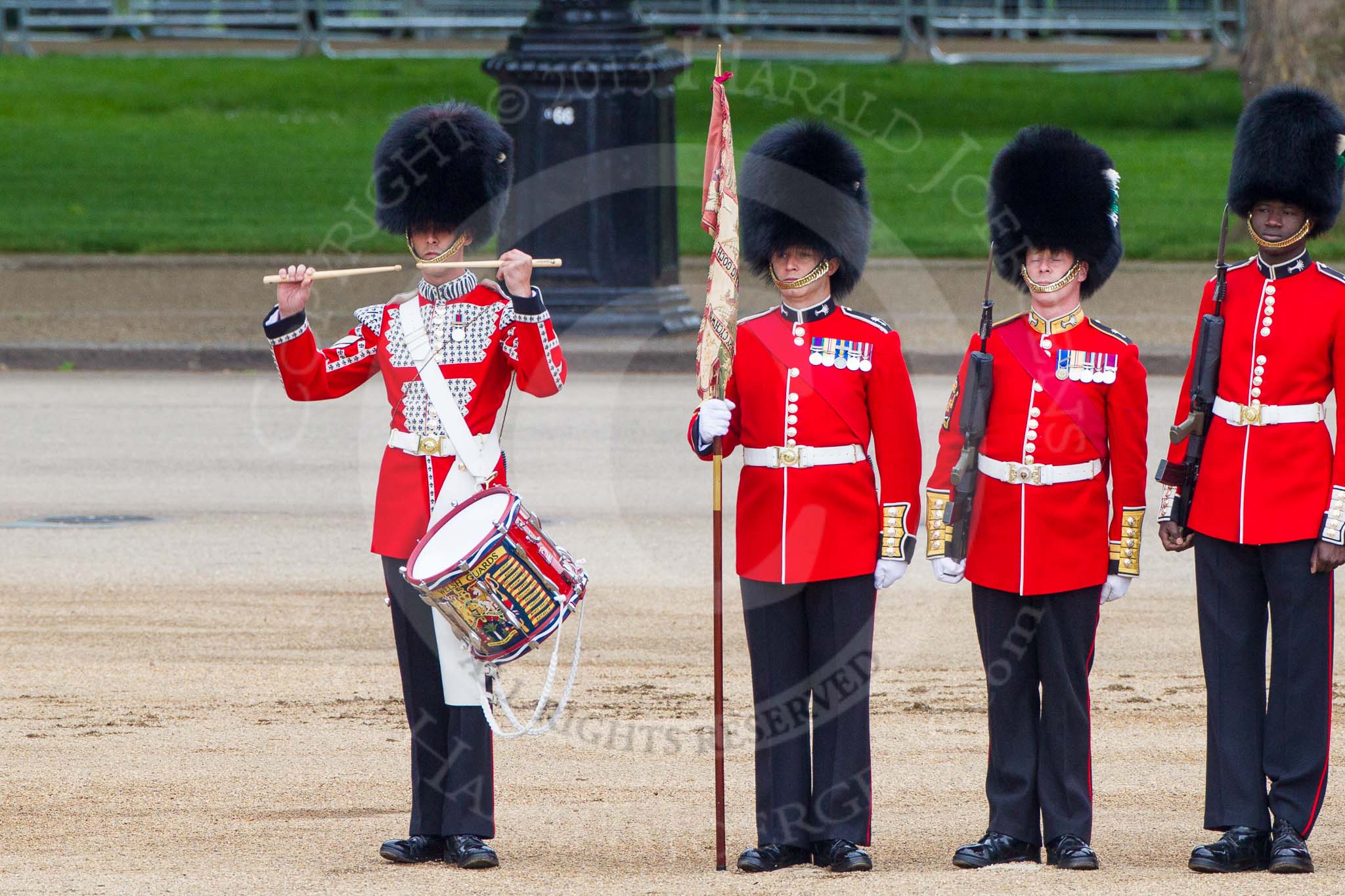 Major General's Review 2013: The "Lone Drummer", Lance Corporal Christopher Rees, salutes with his drumsticks before re-joining the band..
Horse Guards Parade, Westminster,
London SW1,

United Kingdom,
on 01 June 2013 at 11:14, image #359