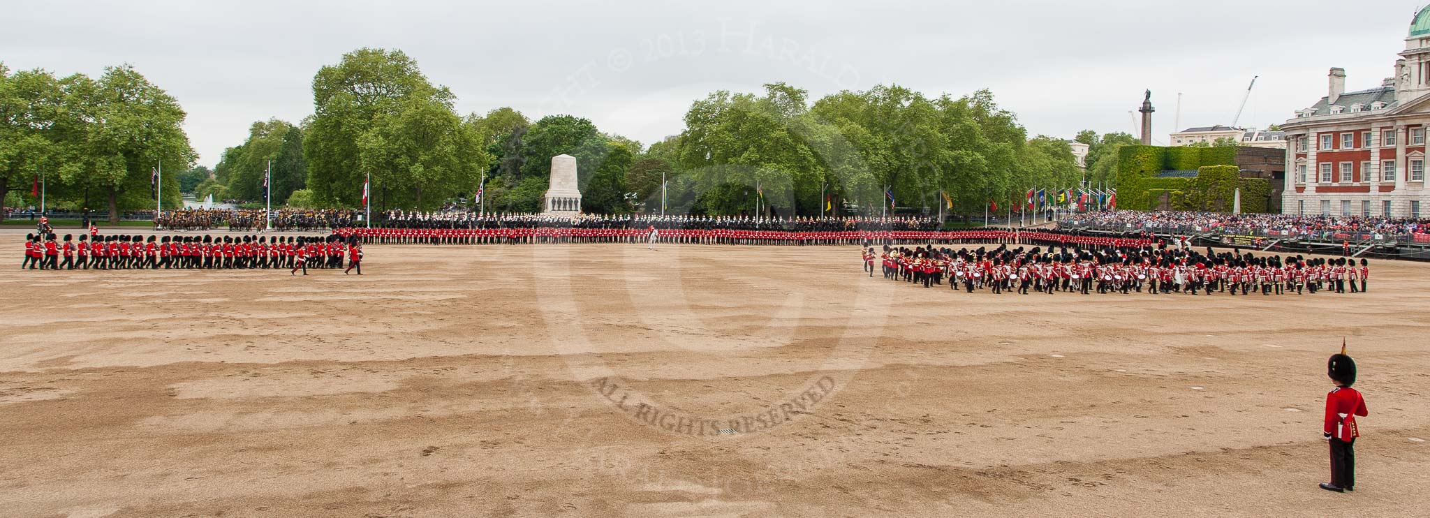Major General's Review 2013: A wide angle overview of Horse Guards Parade. on the left, No. 1 Guard (Escort for the Colour),1st Battalion Welsh Guards is moving forward to receive the Colour..
Horse Guards Parade, Westminster,
London SW1,

United Kingdom,
on 01 June 2013 at 11:16, image #373