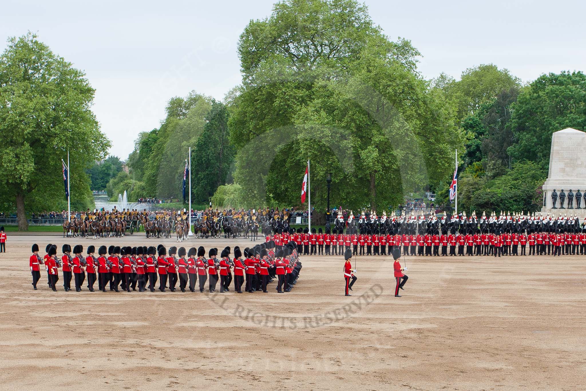 Major General's Review 2013: A wide angle overview of Horse Guards Parade. on the left, No. 1 Guard (Escort for the Colour),1st Battalion Welsh Guards is moving forward to receive the Colour..
Horse Guards Parade, Westminster,
London SW1,

United Kingdom,
on 01 June 2013 at 11:16, image #375