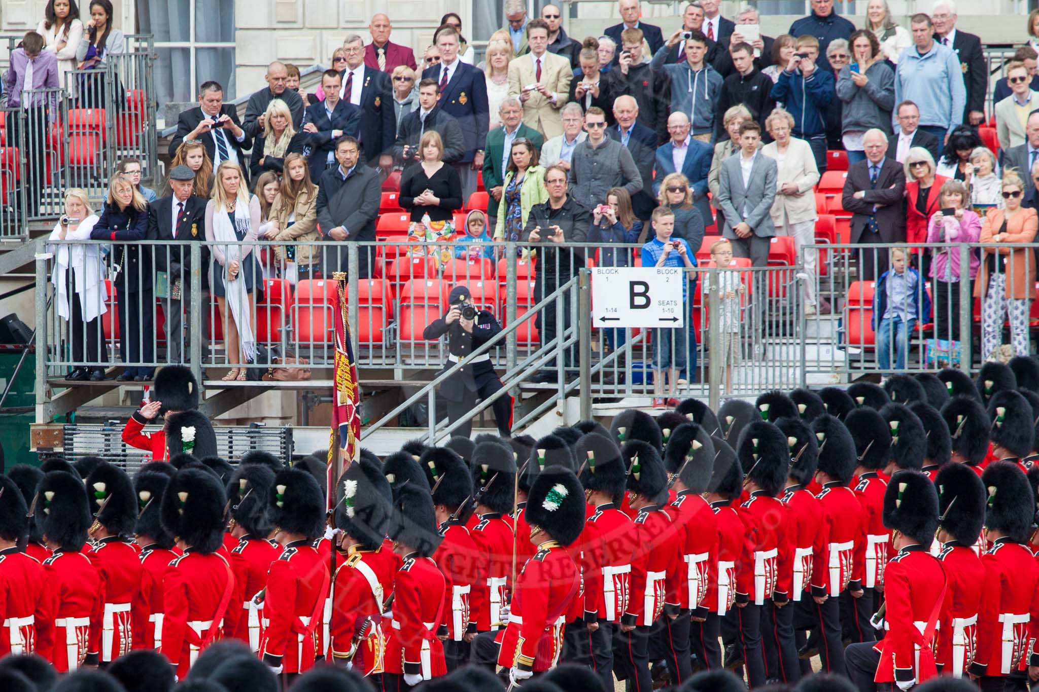 Major General's Review 2013: No. 1 Guard, the Escort to the Colour),1st Battalion Welsh Guards, with the Ensign carrting the Colour behind the lines of guardsmen, during the March Past..
Horse Guards Parade, Westminster,
London SW1,

United Kingdom,
on 01 June 2013 at 11:37, image #517