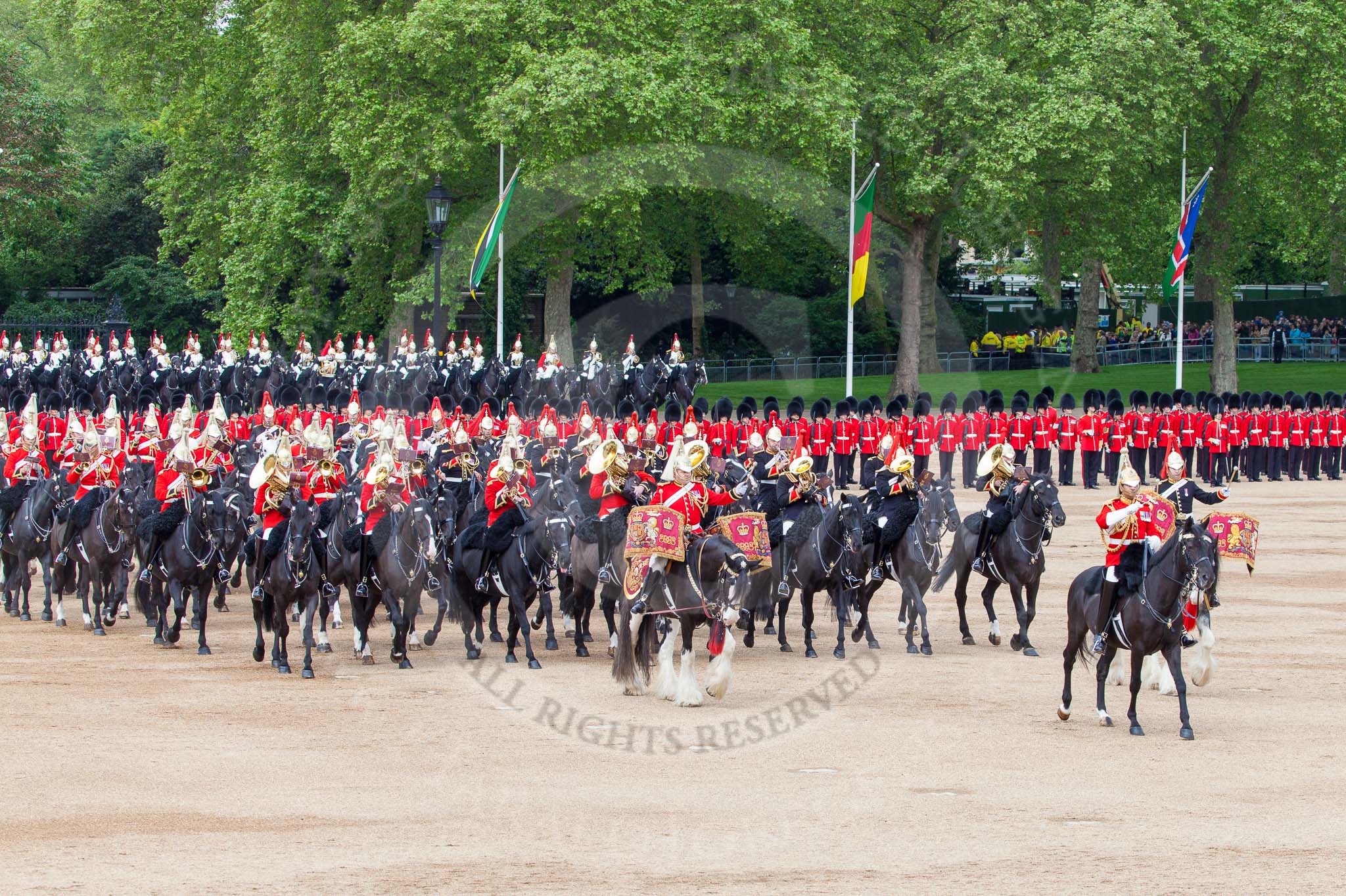 Major General's Review 2013: The Director of Music of the Household Cavalry, Major Paul Wilman, The Life Guards, during the Mounted Troops Ride Past. Behind him the kettle drummer from The Blues and Royals..
Horse Guards Parade, Westminster,
London SW1,

United Kingdom,
on 01 June 2013 at 11:51, image #583