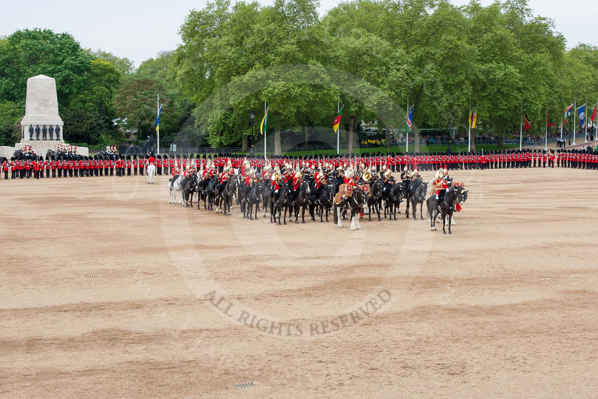 Major General's Review 2013: The Director of Music of the Household Cavalry, Major Paul Wilman, The Life Guards, during the Mounted Troops Ride Past. Behind him the kettle drummer from The Blues and Royals..
Horse Guards Parade, Westminster,
London SW1,

United Kingdom,
on 01 June 2013 at 11:51, image #589