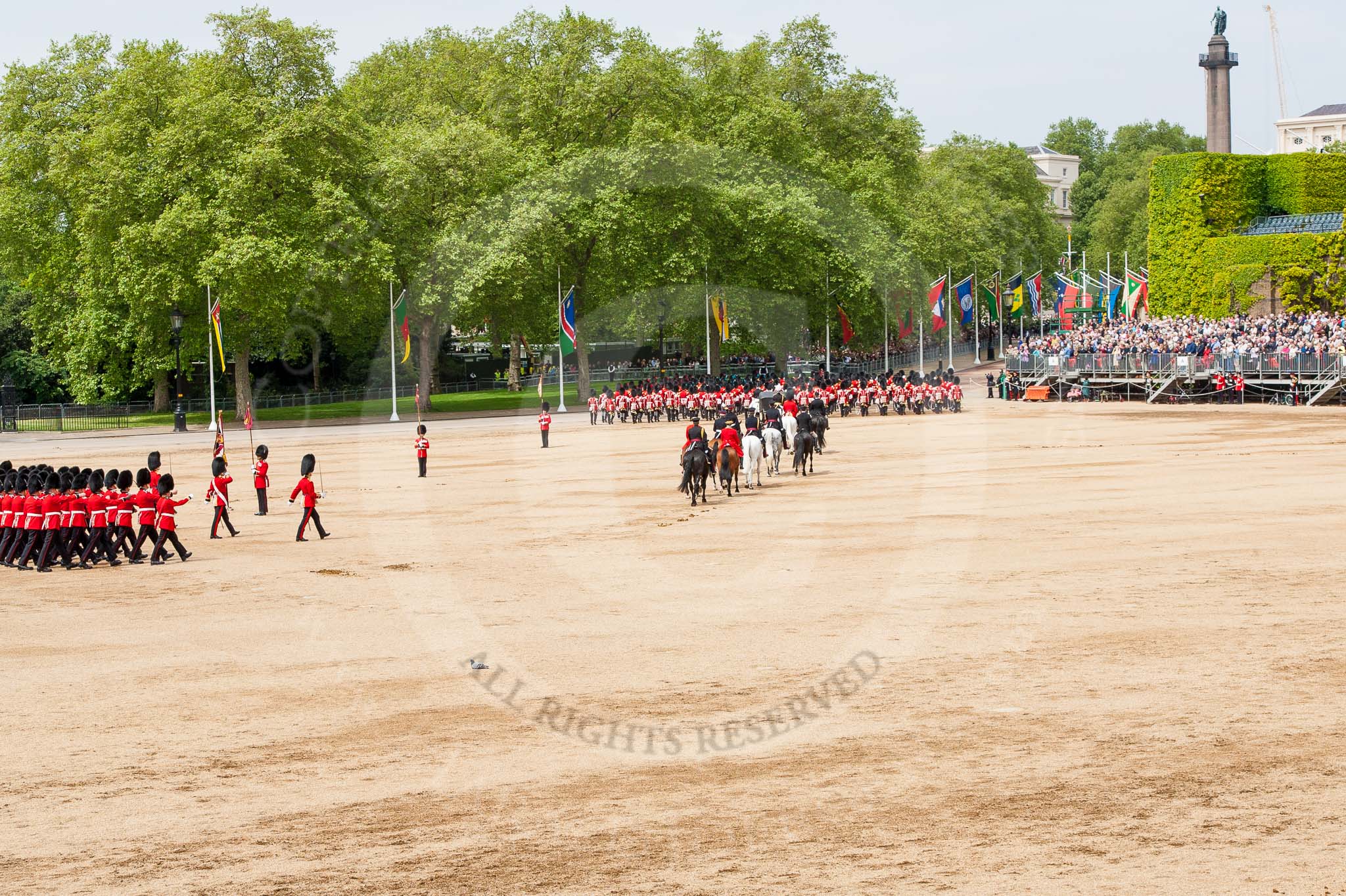 Major General's Review 2013: The March Off - the Massed Bands are leaving towards The Mall, followed by the coach that will carry HM The Queen and HRH The Duke of Kent..
Horse Guards Parade, Westminster,
London SW1,

United Kingdom,
on 01 June 2013 at 12:08, image #718