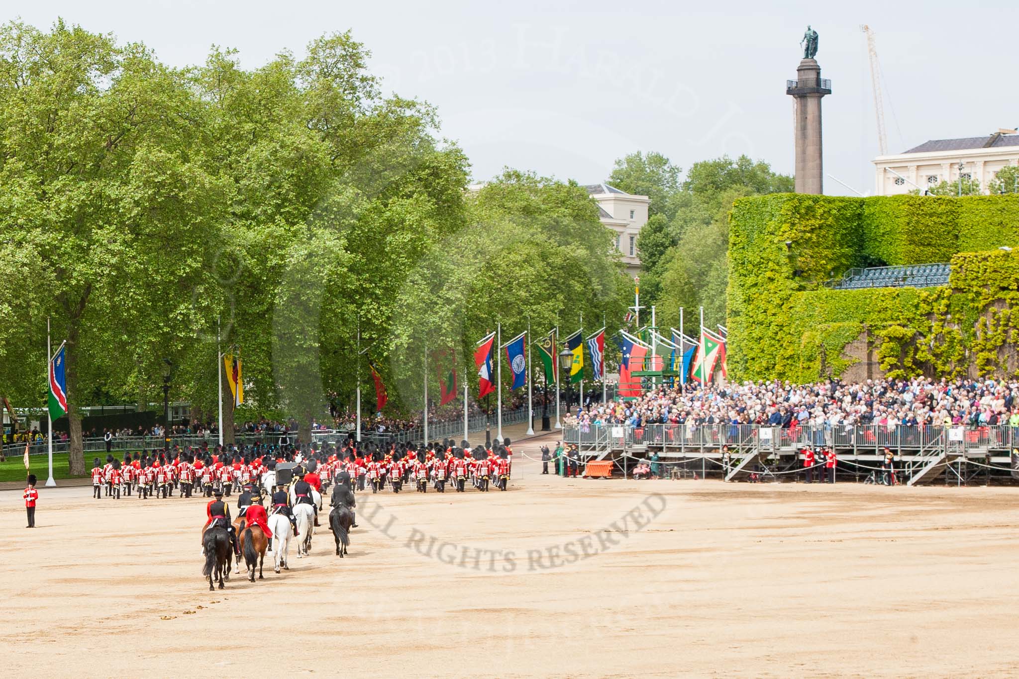 Major General's Review 2013: The March Off - the Massed Bands are leaving towards The Mall, followed by the coach that will carry HM The Queen and HRH The Duke of Kent..
Horse Guards Parade, Westminster,
London SW1,

United Kingdom,
on 01 June 2013 at 12:08, image #719