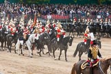 Major General's Review 2013: The Ride Past - The Sovereign's Escort, Household Cavalry, here the Field Officer of the Escort, Major Nick Stewart, The Life Guards, followed by the Trumpeter (Lance Corporal Ben Ruffer, The Life Guards), the Standard Bearer (Squadron Corporal Major Kris Newell, The Life Guards) and the Standard Coverer (Staff Corporal Steve Chinn, The Life Guards)..
Horse Guards Parade, Westminster,
London SW1,

United Kingdom,
on 01 June 2013 at 11:56, image #646