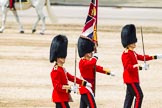 Major General's Review 2013: No. 1 Guard (Escort for the Colour),1st Battalion Welsh Guards, during the March Off. Ensign, Second Lieutenant Joel Dinwiddle, carrying the Colour. On his right Major E N Launders, on his left Captain F O Lloyd-George..
Horse Guards Parade, Westminster,
London SW1,

United Kingdom,
on 01 June 2013 at 12:08, image #713