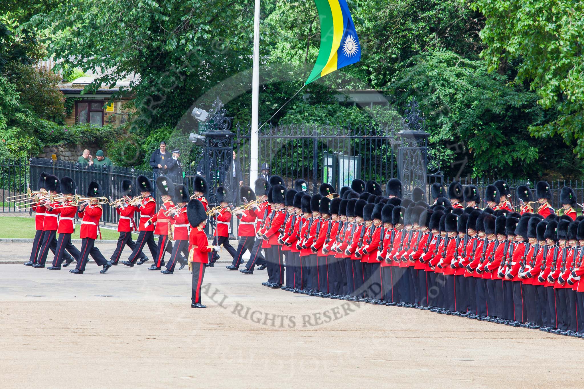 Trooping the Colour 2013: The Band of the Welsh Guards is marching along the St James's Park side of Horse Guards parade, here passing No. 3 Guard, , 1st Battalion Welsh Guards. Image #104, 15 June 2013 10:30 Horse Guards Parade, London, UK