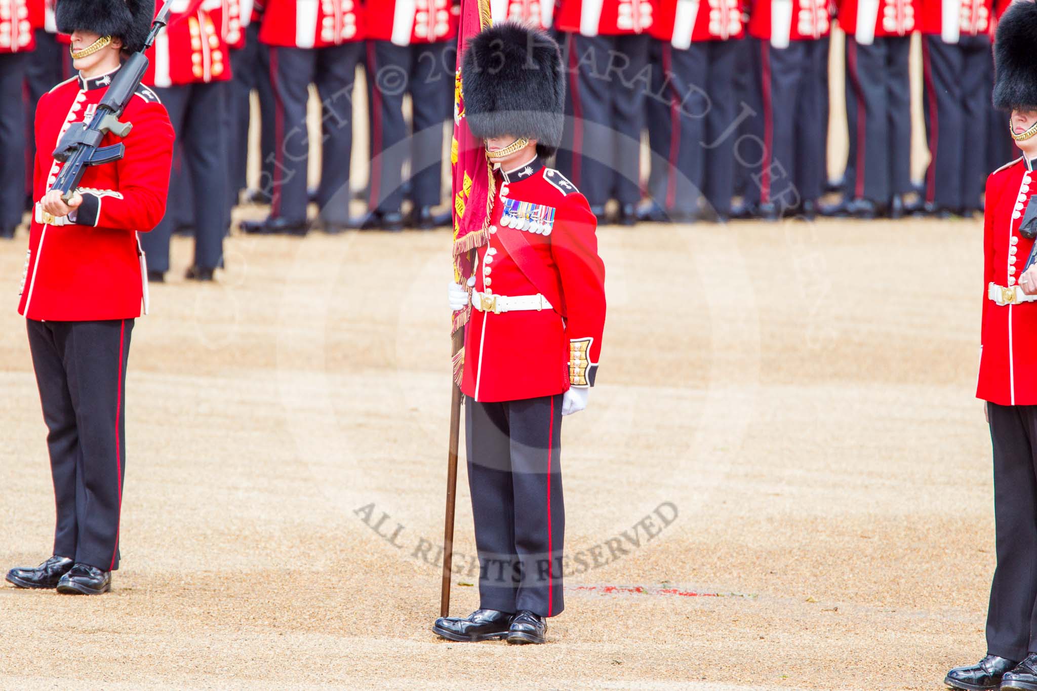 Trooping the Colour 2013: The Colour has been uncased. A detailed photographic record of the uncasing can be found in The Major Generals Review and The Colonels Review. Image #121, 15 June 2013 10:33 Horse Guards Parade, London, UK