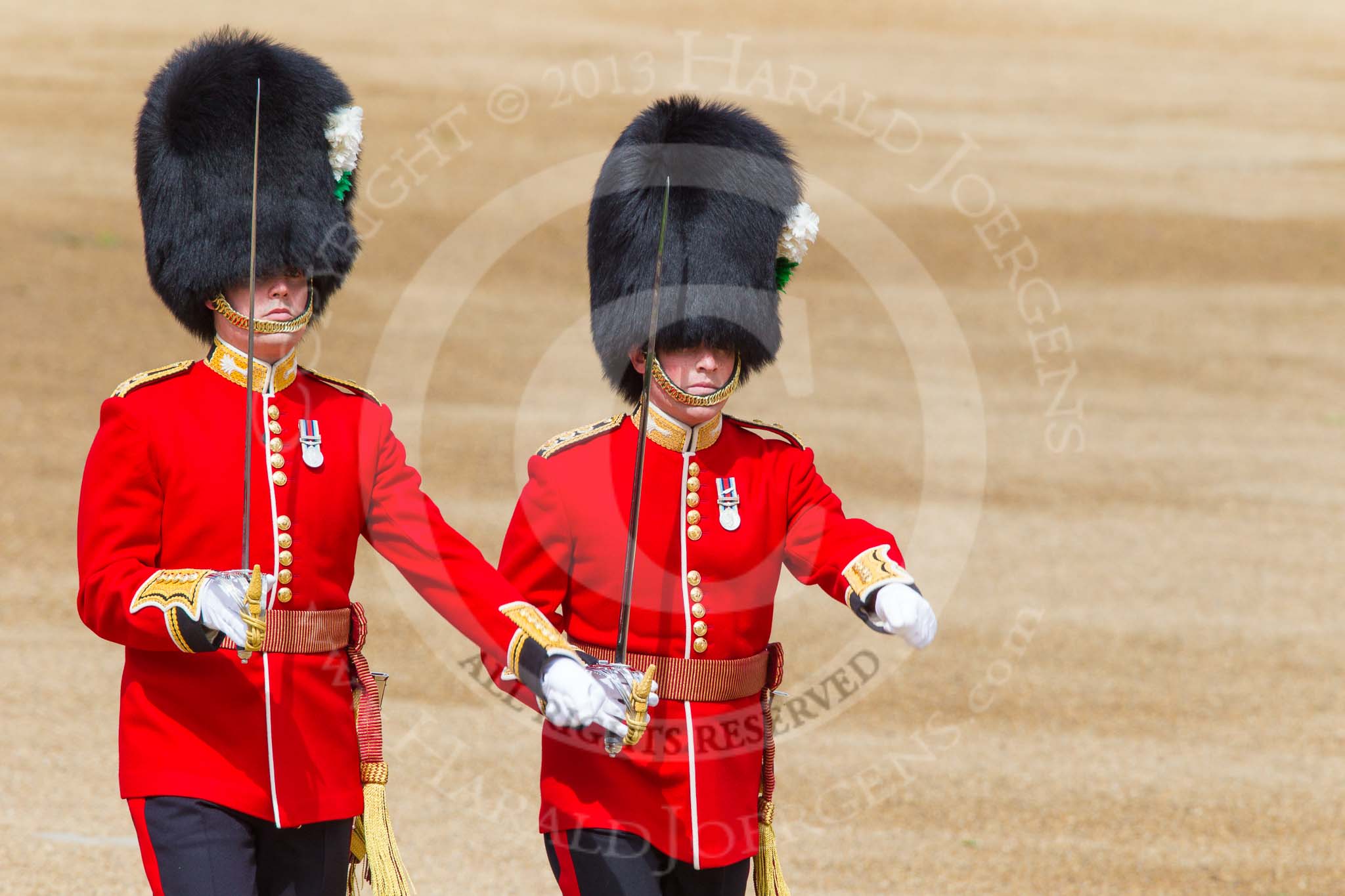 Trooping the Colour 2013: The Subaltern of No. 1 Guard, Captain F O Lloyd-George, and the Subaltern of No. 2 Guard, Captain B Bardsley, are marching together to Horse Guards Arch. They will return later, with the other 16 officers, three for each guard. Image #122, 15 June 2013 10:33 Horse Guards Parade, London, UK