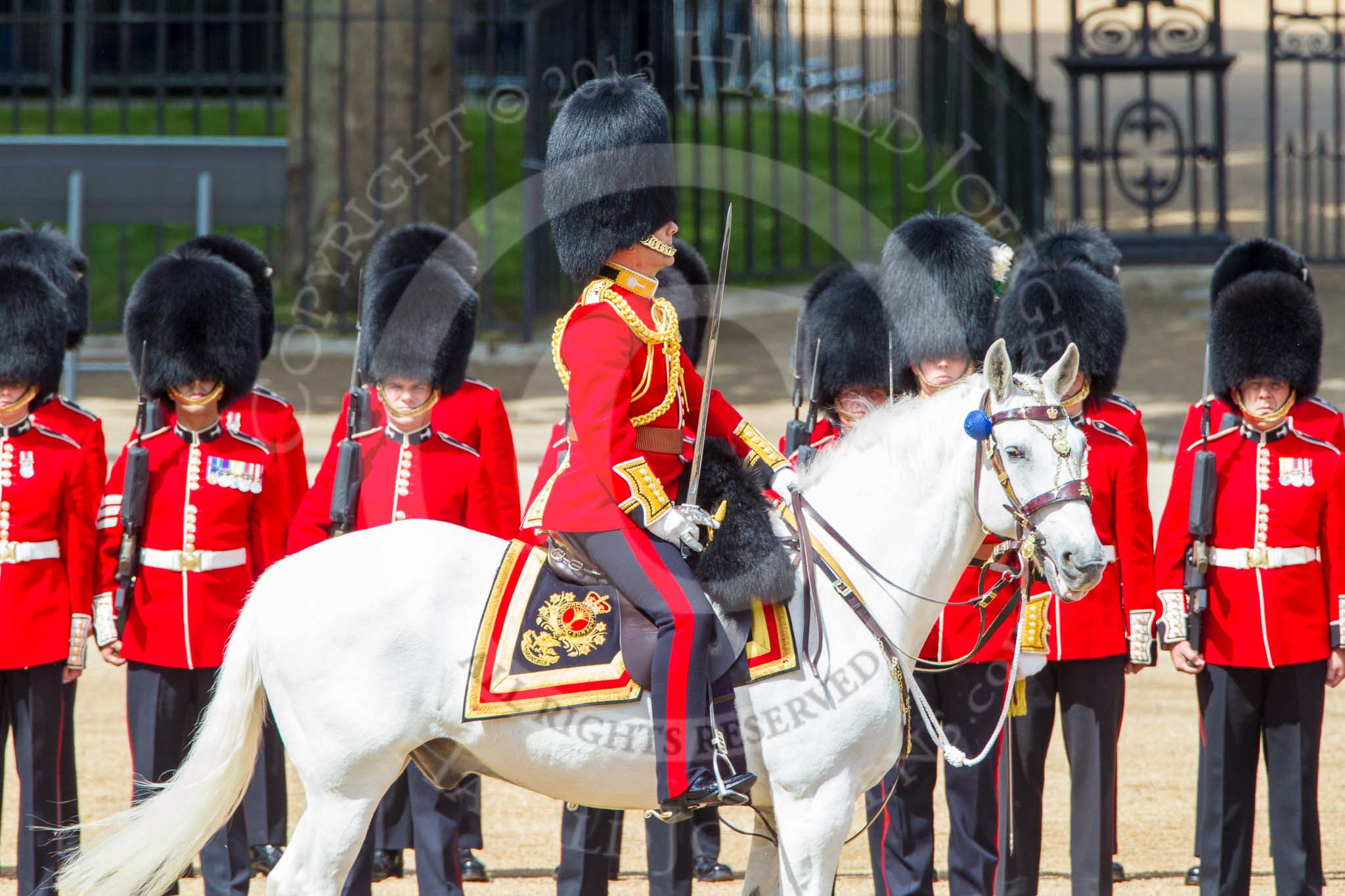 Trooping the Colour 2013: The Field Officer in Brigade Waiting, Lieutenant Colonel Dino Bossi, Welsh Guards, has moved to the side of the line to give way for the members of the royal family due to arrive. Image #173, 15 June 2013 10:44 Horse Guards Parade, London, UK