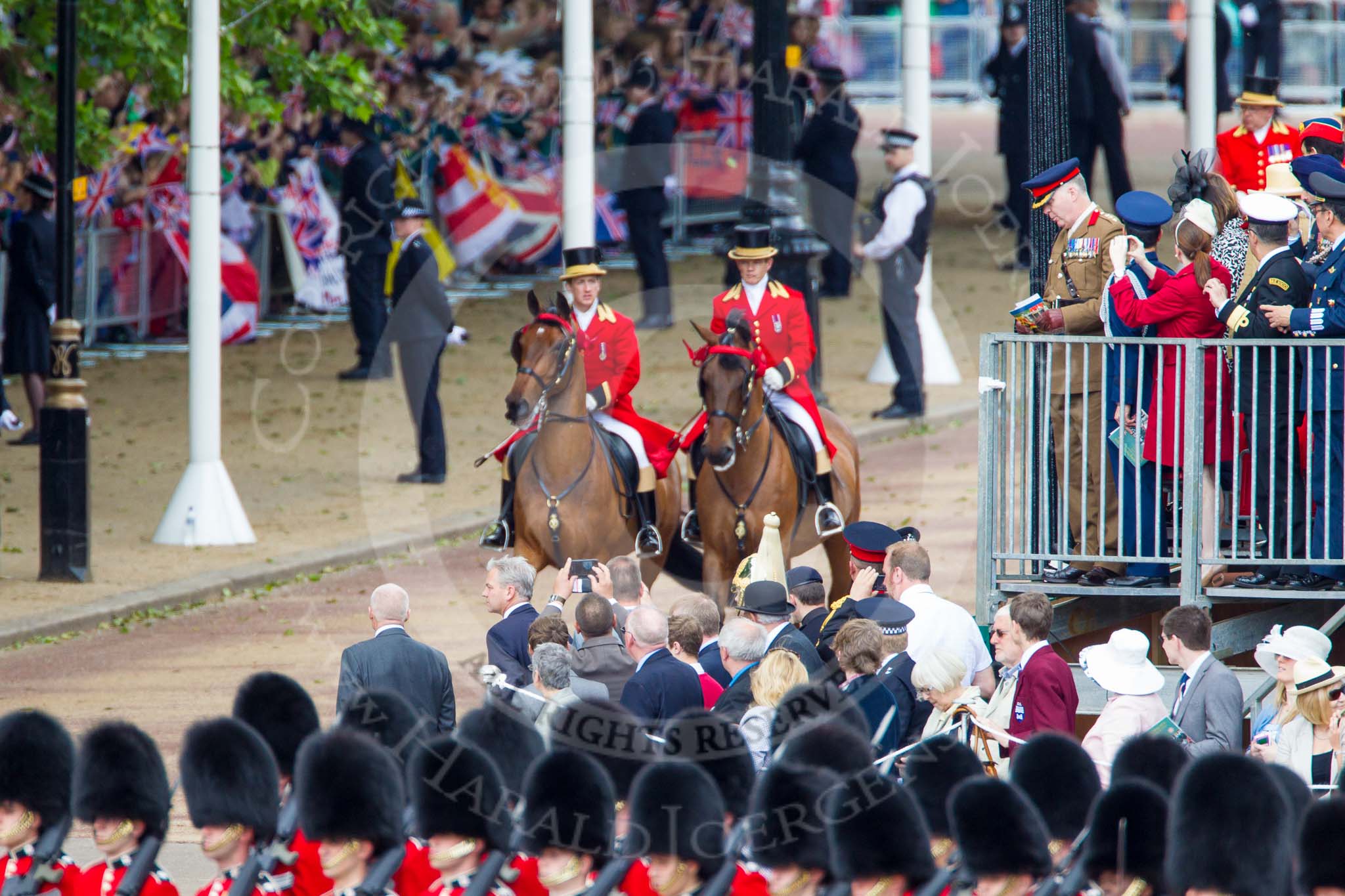 Trooping the Colour 2013: Two grooms are leading the line of coaches carrying members of the Royal Family across Horse Guards Parade. Image #179, 15 June 2013 10:48 Horse Guards Parade, London, UK