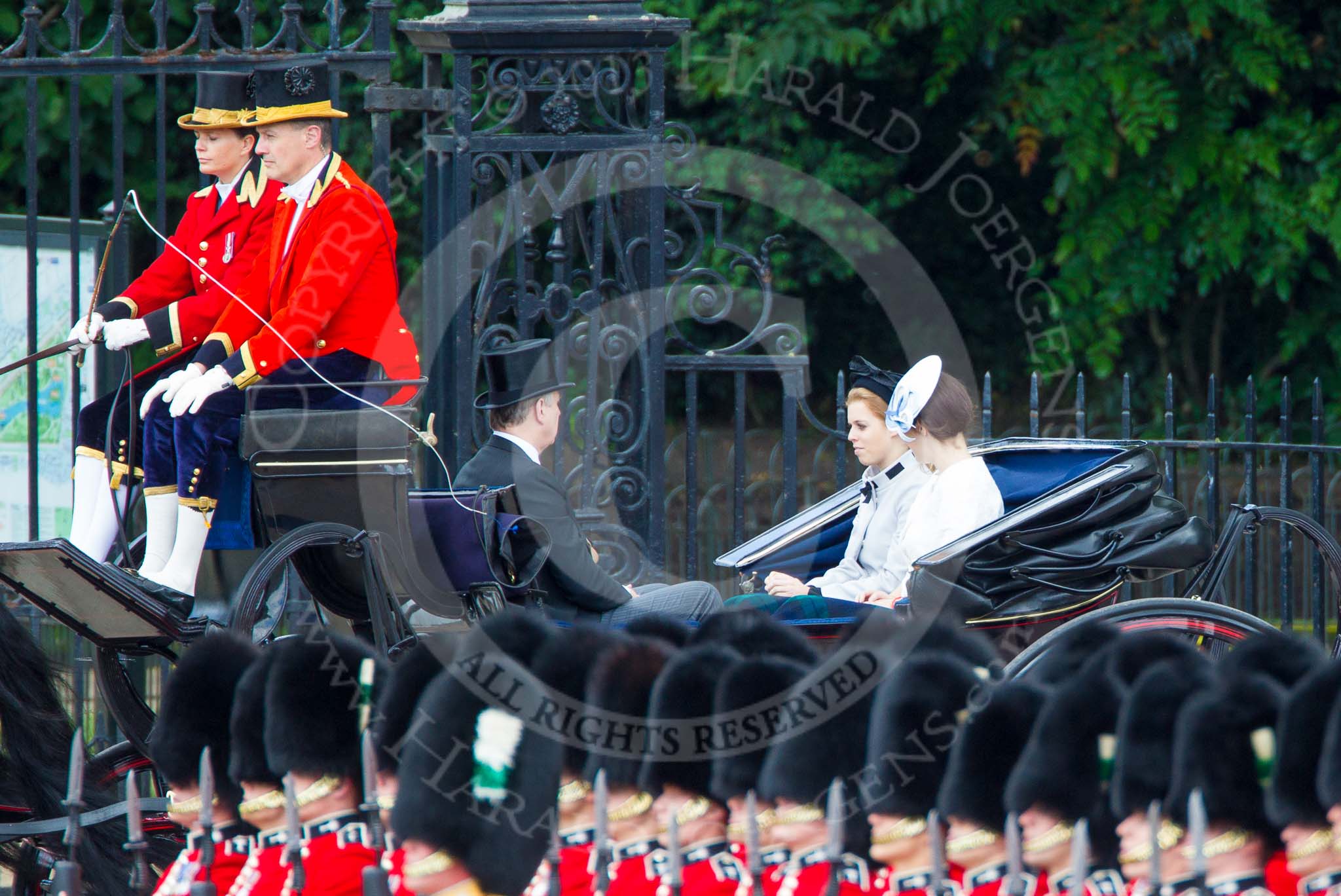 Trooping the Colour 2013: HRH The Duke of York  and his daughters, HRH Princess Beatrice of York and HRH Princess Eugenie of York in the second barouche carriage on the way across Horse Guards Parade to watch the parade from the Major General's office. Image #191, 15 June 2013 10:49 Horse Guards Parade, London, UK