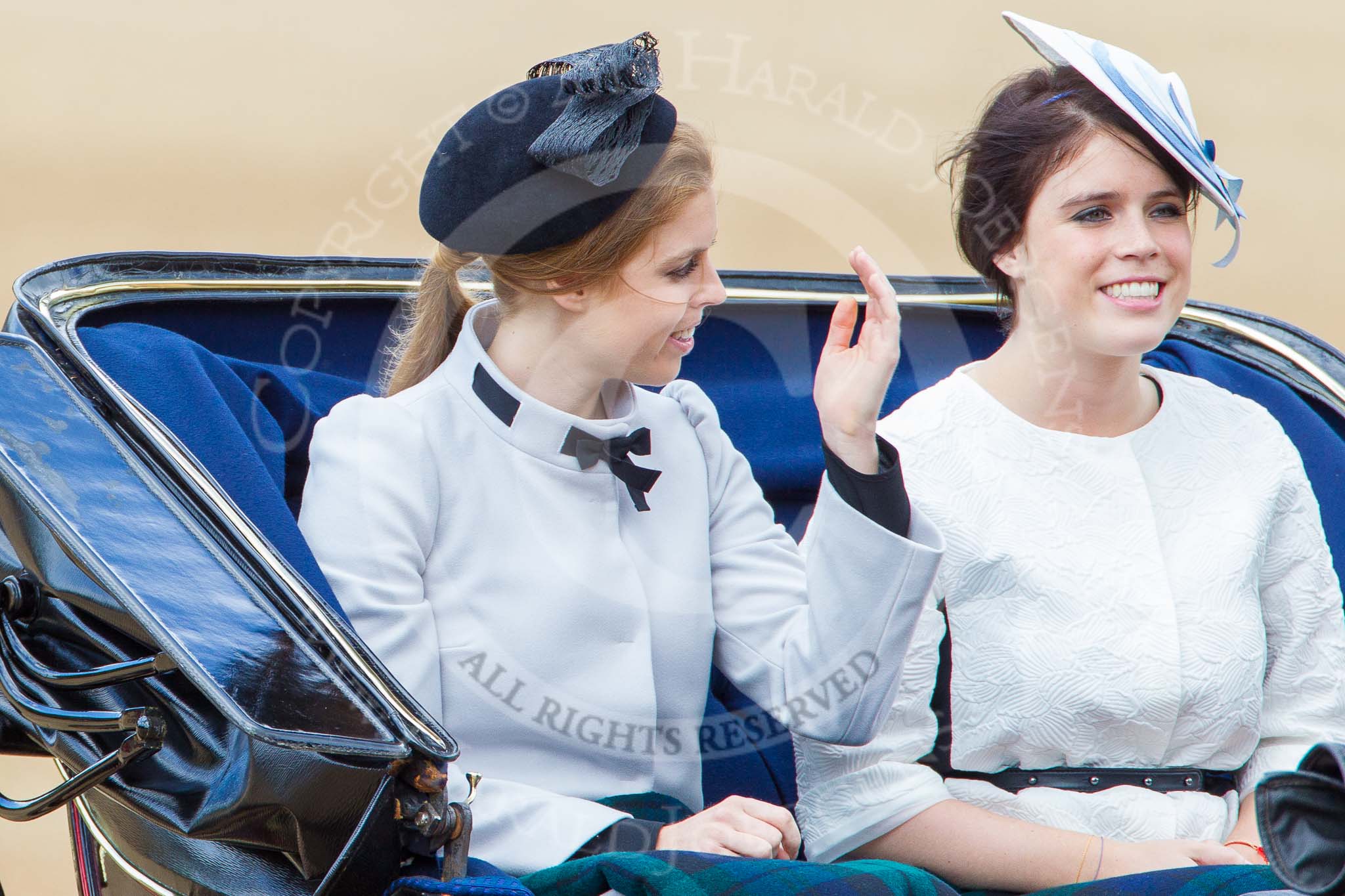 Trooping the Colour 2013: HRH Princess Beatrice of York and HRH Princess Eugenie of York in the second barouche carriage on the way across Horse Guards Parade to watch the parade from the Major General's office..
Horse Guards Parade, Westminster,
London SW1,

United Kingdom,
on 15 June 2013 at 10:50, image #211