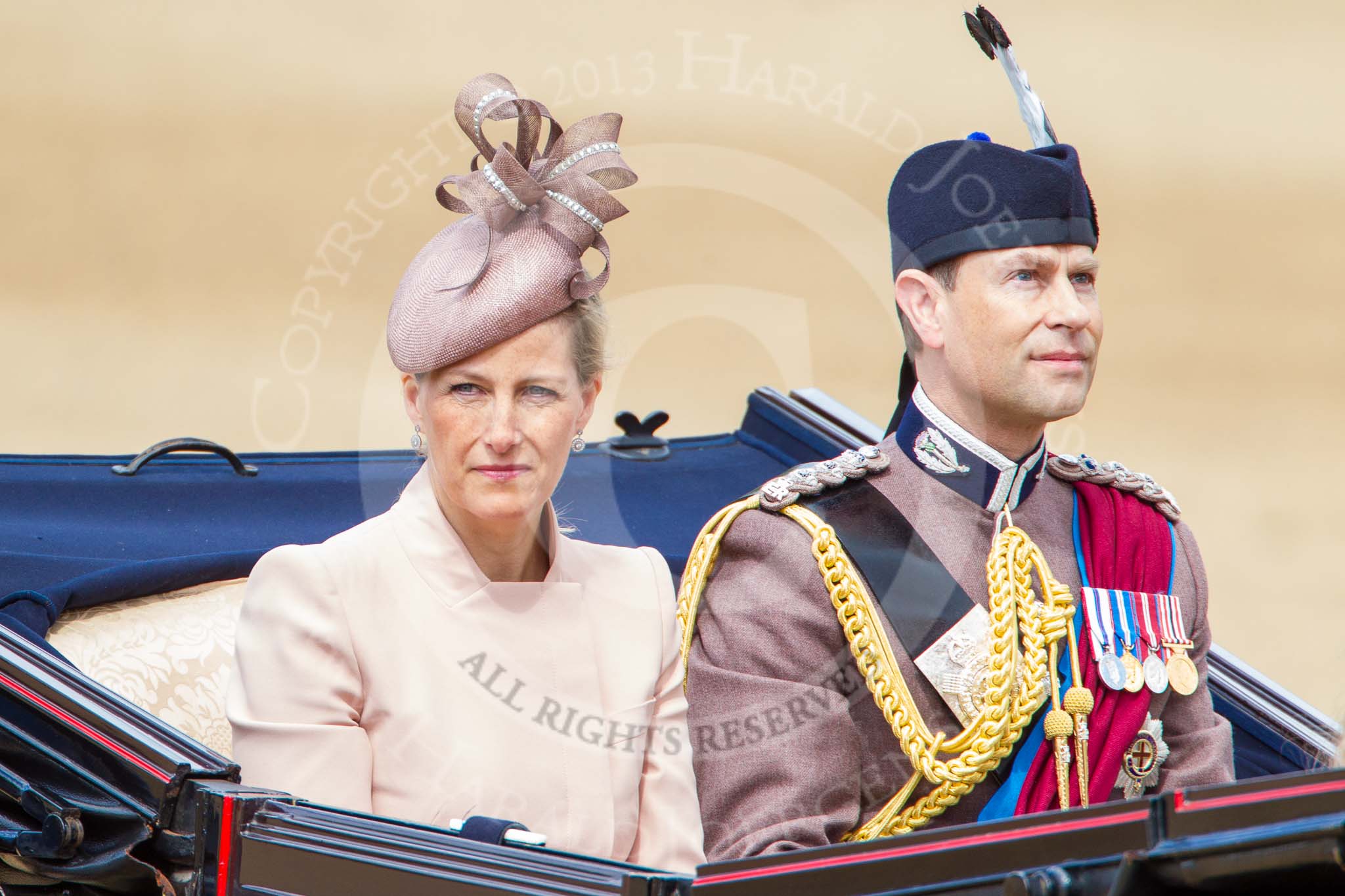 Trooping the Colour 2013: HRH The Countess of Wessex and HRH The Earl of Wessex in the third barouche carriage on the way across Horse Guards Parade to watch the parade from the Major General's office..
Horse Guards Parade, Westminster,
London SW1,

United Kingdom,
on 15 June 2013 at 10:50, image #213