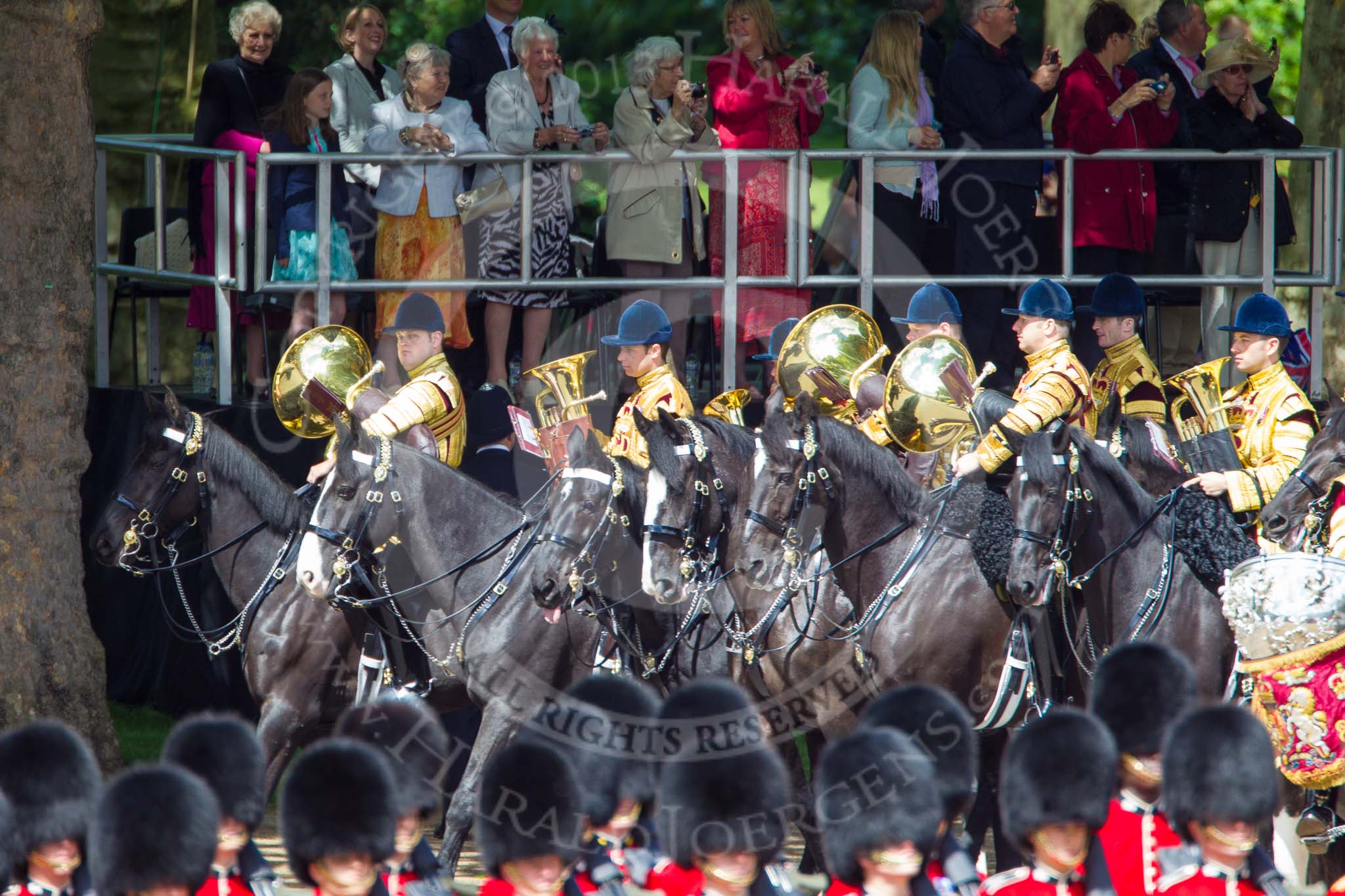 Trooping the Colour 2013: The Mounted Bands of the Household Cavalry are marching down Horse Guards Road as the third element of the Royal Procession, taking position at the northern side of Horse Guards Parade, next to St James's Park. Image #242, 15 June 2013 10:57 Horse Guards Parade, London, UK