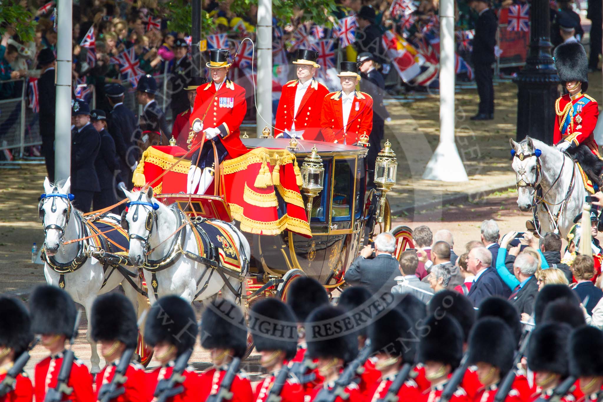 Trooping the Colour 2013: The Glass Coach carrying HM The Queen arrives at Horse Guards Parade, drawn by two Windsor Grey horses. On the very right HRH The Duke of Cambridge. Image #250, 15 June 2013 10:58 Horse Guards Parade, London, UK