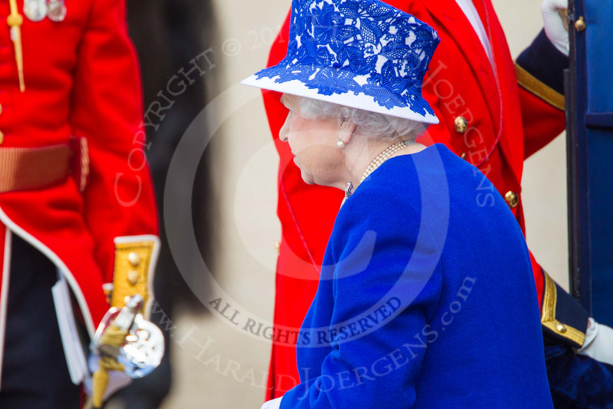 Trooping the Colour 2013: HM The Queen leaving the Glass Coach to be o the dais at exactly 1100 hours. Image #293, 15 June 2013 11:00 Horse Guards Parade, London, UK