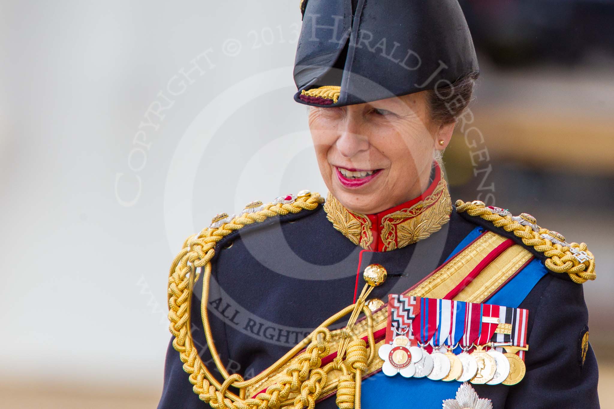 Trooping the Colour 2013: Close-up of HRH The Princess Royal, Colonel The Blues and Royals (Royal Horse Guards and 1st Dragoons), smiling, on horseback during the Inspection of the line..
Horse Guards Parade, Westminster,
London SW1,

United Kingdom,
on 15 June 2013 at 11:02, image #314