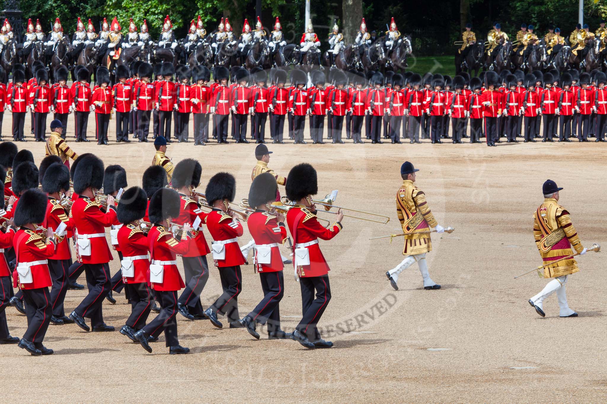 Trooping the Colour 2013: The Massed Band Troop begins with the slow march - the Waltz from Les Huguenots. The Third and Fourth Division of the Sovereign's Escort, The Blues and Royals, can be seen on top of the image. Image #397, 15 June 2013 11:10 Horse Guards Parade, London, UK
