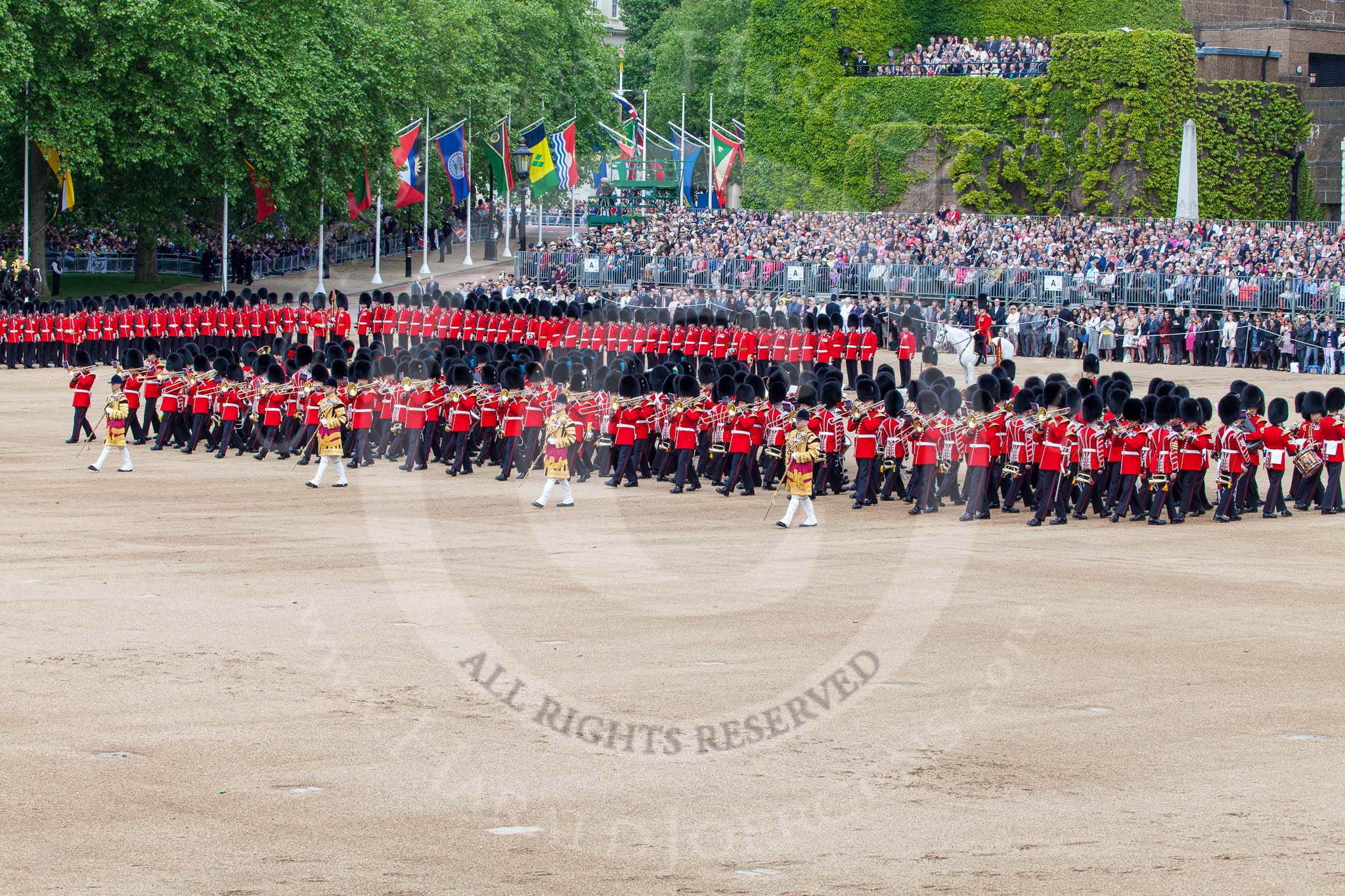 Trooping the Colour 2013: The Massed Band Troop - the countermarch in quick time is Heroes' Return. Behind the massed bands is No. 6 Guard, and next to them the Adjutant of the Parade and the Colour Party. Image #403, 15 June 2013 11:11 Horse Guards Parade, London, UK