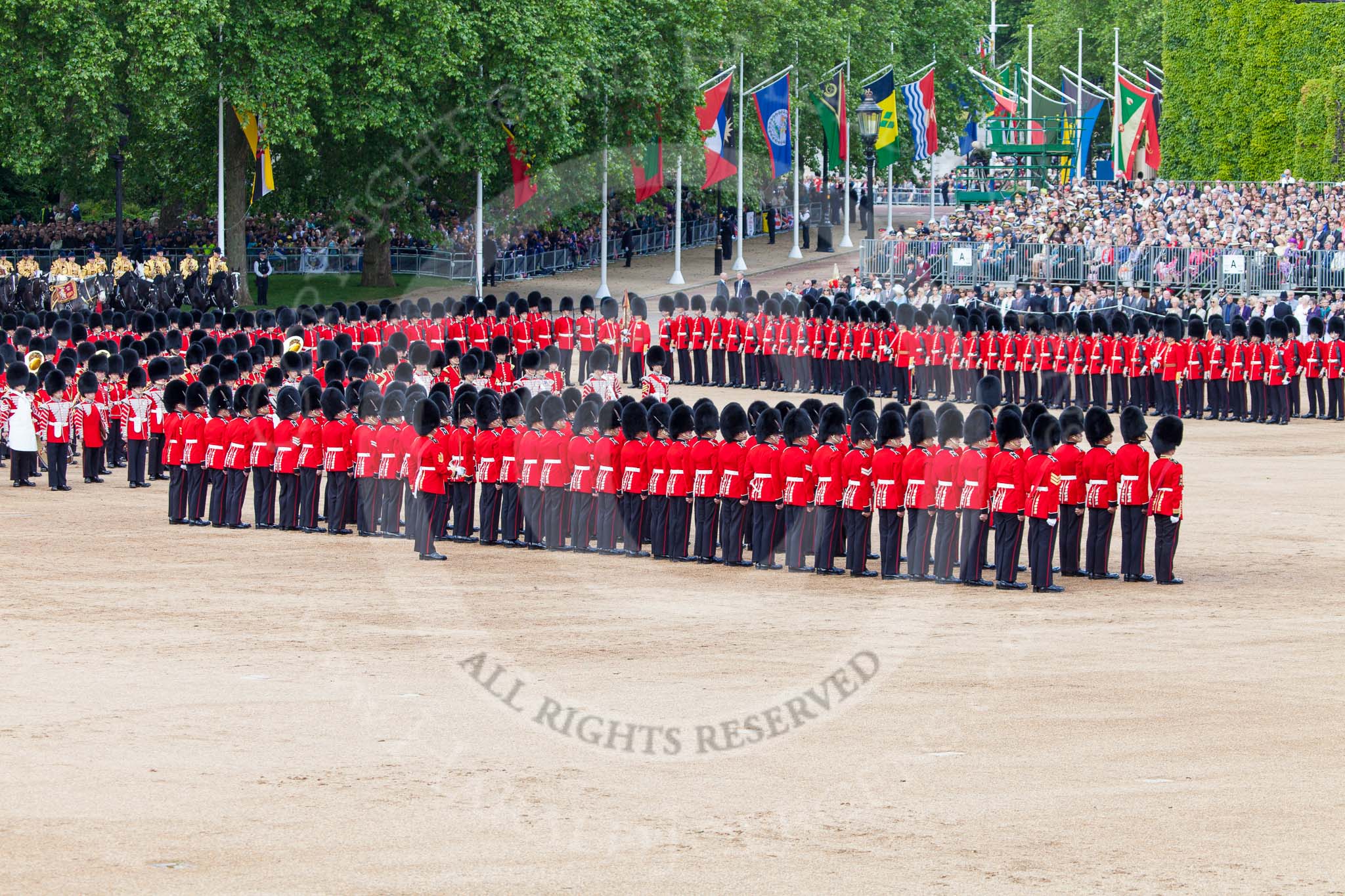 Trooping the Colour 2013: The Regimental Sergeant Major, WO1 Martin Topps, Welsh Guards, standing behind No. 1 Guard, will soon march around No. 1 Guard to reveive the Colour. Image #448, 15 June 2013 11:19 Horse Guards Parade, London, UK