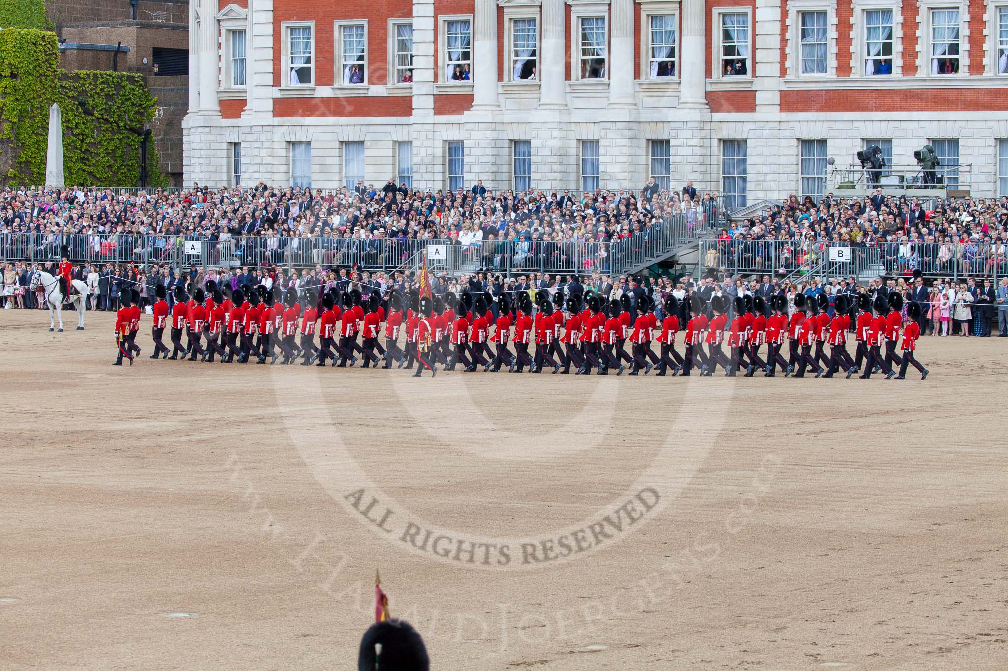 Trooping the Colour 2013: The Escort Tto the Colour is marching towards No.6 Guard, to begin the trooping the Colour through the ranks. Image #485, 15 June 2013 11:24 Horse Guards Parade, London, UK