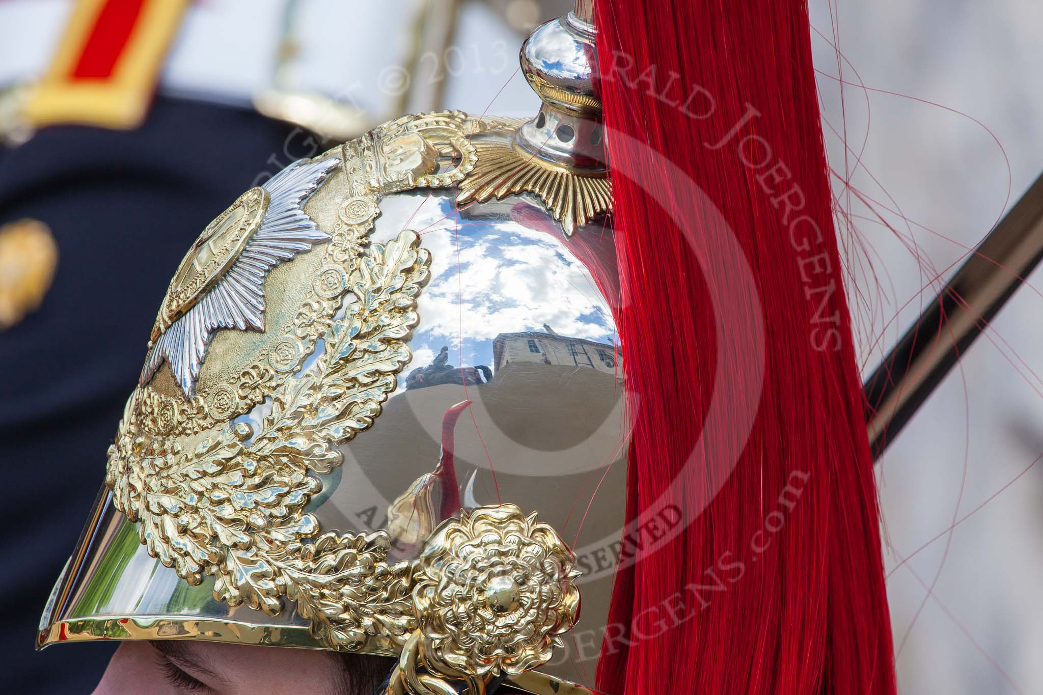 Trooping the Colour 2013: Reflection of the immaculate helmet of one of the four troopers from the Blues and Royals that are part of the Royal Procession. Image #521, 15 June 2013 11:31 Horse Guards Parade, London, UK
