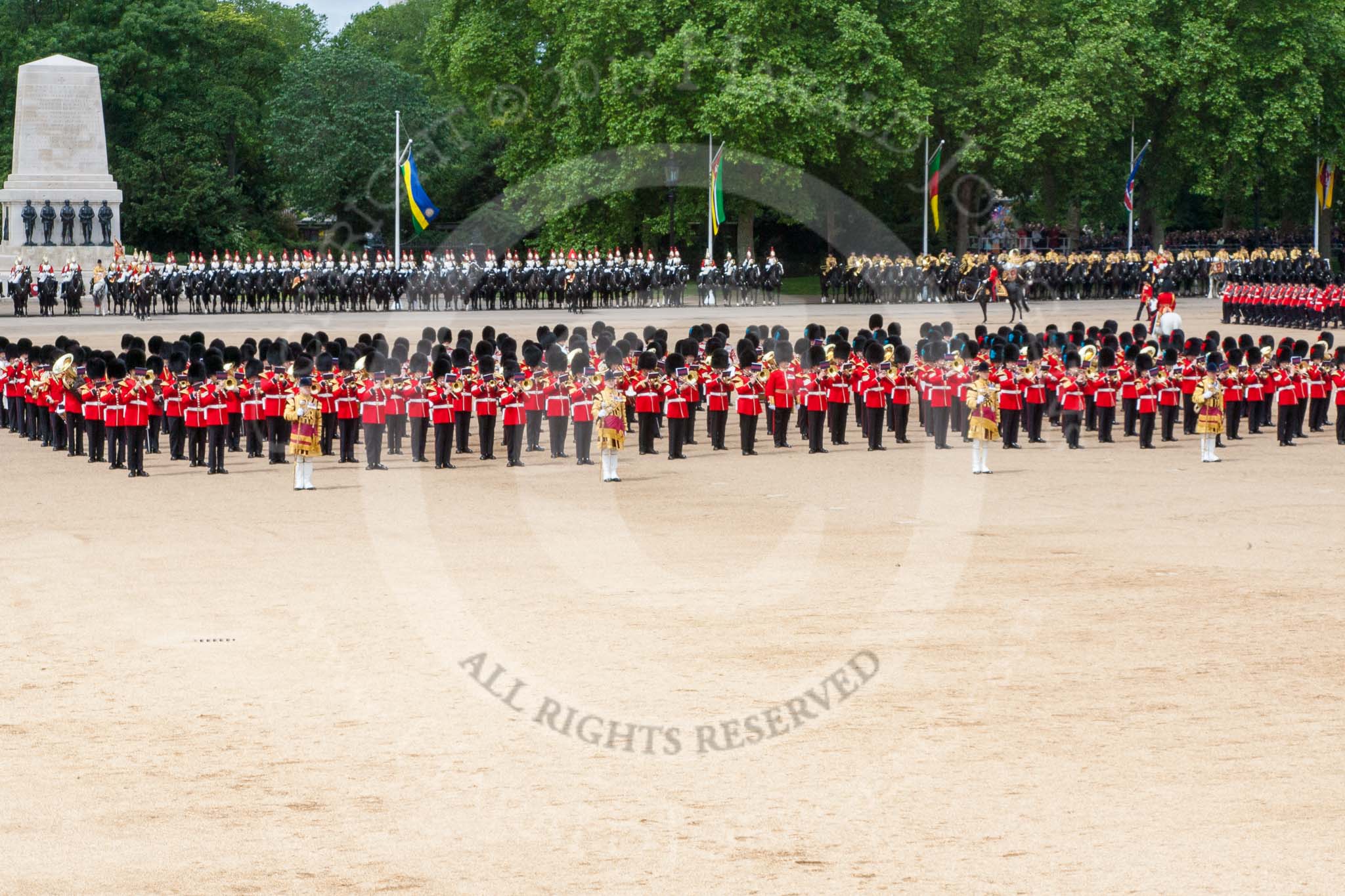 Trooping the Colour 2013: The Massed Bands, in the centre of Horse Guards Parade during the March Past. Image #571, 15 June 2013 11:41 Horse Guards Parade, London, UK