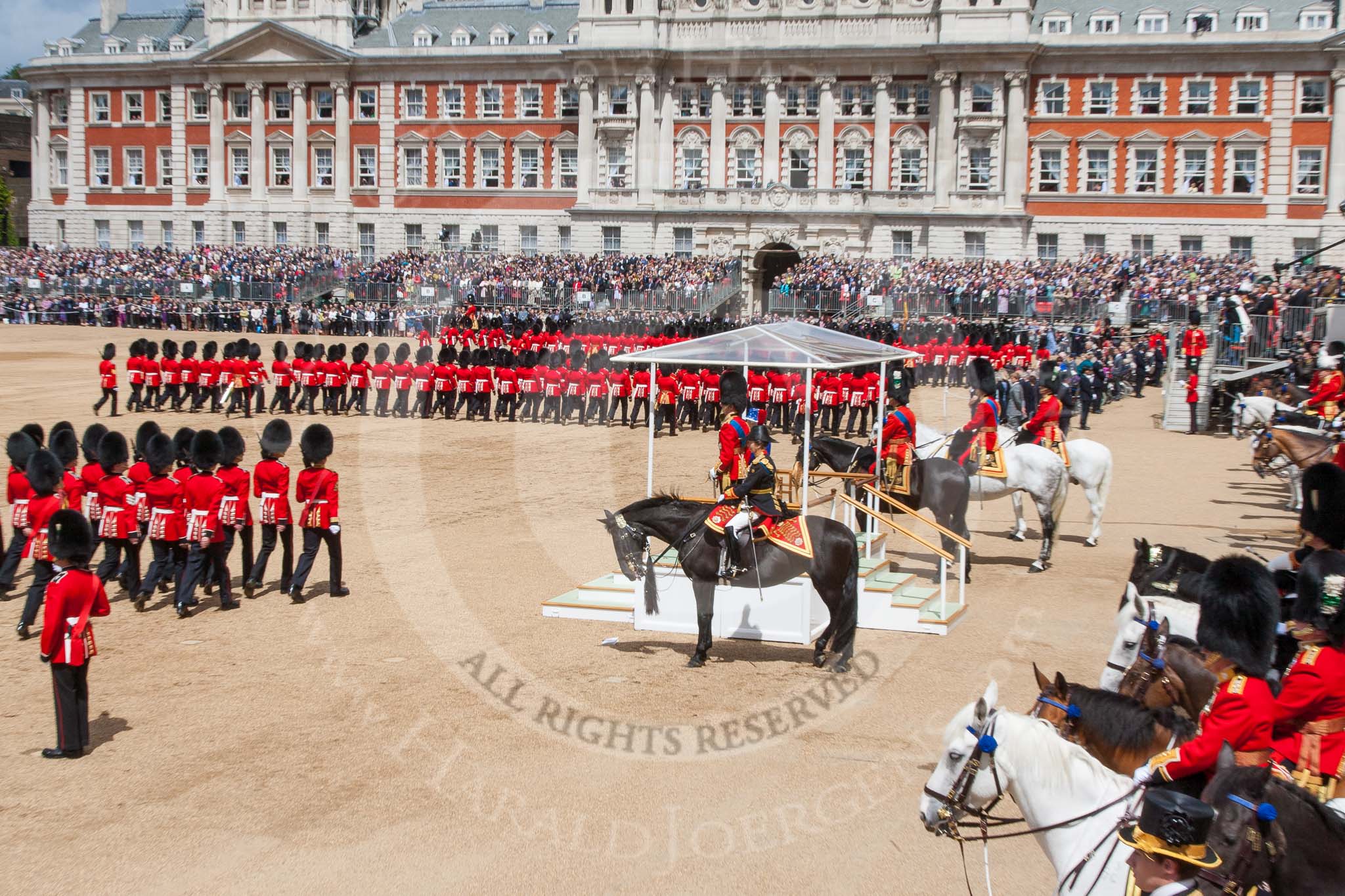 Trooping the Colour 2013: The Royal Colonels, and HRH The Duke of Kent and HM The Queen are standing on the dais, during the March Past. Image #609, 15 June 2013 11:46 Horse Guards Parade, London, UK