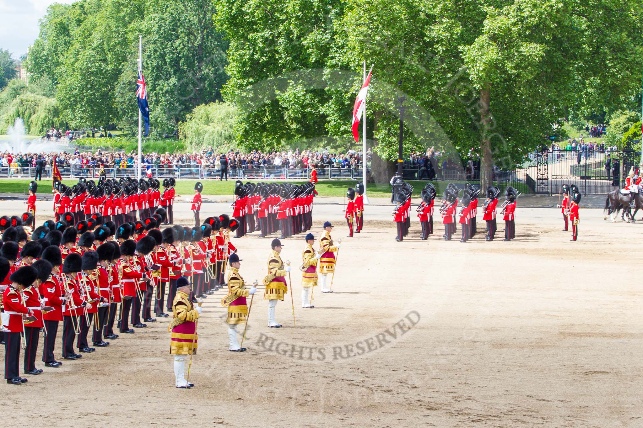 Trooping the Colour 2013: Top left, in front of St James's Park Lake, is No. 1 Guard, the Escort to the Colour, about to lead the other five guards divisions during the March Off. Image #775, 15 June 2013 12:05 Horse Guards Parade, London, UK