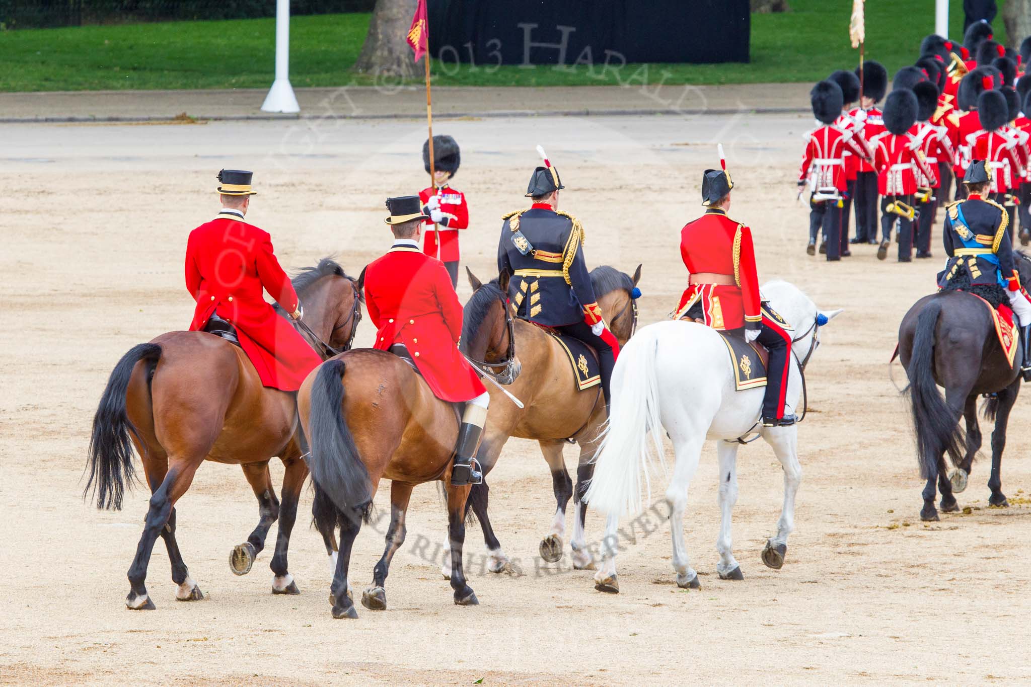 Trooping the Colour 2013: Following the Royal Colonels (HTH the Princess Royal on the right) are the Crown Equerry Colonel Toby Browne and the Equerry in Waiting to Her Majesty, Lieutenant Colonel Alexander Matheson of Matheson, younger. Behind them two grooms from the Royal Household. Image #828, 15 June 2013 12:11 Horse Guards Parade, London, UK