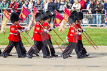 Trooping the Colour 2013: The 'Keepers of the Ground', guardsmen bearing marker flags for their respective regiments, marching on Horse Guards Road along St James's Park. Image #24, 15 June 2013 09:53 Horse Guards Parade, London, UK