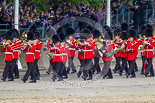 Trooping the Colour 2013: The Band of the Coldstream Guards, led by Senior Drum Major Matthew Betts, Grenadier Guards. Behind them flag waving Brownies in the Youth Camp. Image #38, 15 June 2013 10:10 Horse Guards Parade, London, UK