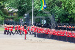 Trooping the Colour 2013: The Band of the Welsh Guards is marching along the St James's Park side of Horse Guards parade, here passing No. 3 Guard, , 1st Battalion Welsh Guards. Image #104, 15 June 2013 10:30 Horse Guards Parade, London, UK