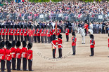 Trooping the Colour 2013: The Ensign, Ensign, Second Lieutenant Joel Dinwiddle, takes posession of the Colour from the Regimental Sergeant Major, WO1 Martin Topps, Welsh Guards. Image #456, 15 June 2013 11:21 Horse Guards Parade, London, UK