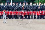 Trooping the Colour 2013: The Ensign troops the Colour along No. 3 Guard, 1st Battalion Welsh Guards. On the left the Field Officer in Brigade Waiting, Lieutenant Colonel Dino Bossi, Welsh Guards. Image #500, 15 June 2013 11:26 Horse Guards Parade, London, UK