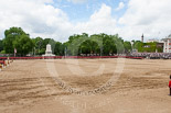 Trooping the Colour 2013: A wide angle overview of Horse Guards Parade after the Ride Past. The Household Cavalry is returning to their initial positions below the flags, next to St James's Park. Image #755, 15 June 2013 12:00 Horse Guards Parade, London, UK