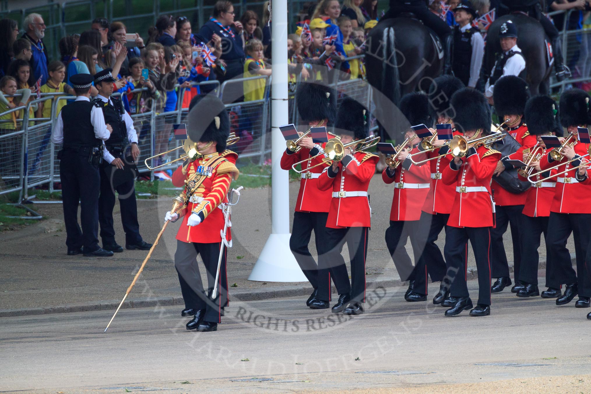 The Band of the Welsh Guards marching from The Mall to Horse Guards Parade, past the Youth Enclosure, during The Colonel's Review 2018 (final rehearsal for Trooping the Colour, The Queen's Birthday Parade)  at Horse Guards Parade, Westminster, London, 2 June 2018, 10:12.