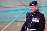 Army photographer in uniform, wearing his medals and cameras, at the Wolseley press stand before The Colonel's Review 2018 (final rehearsal for Trooping the Colour, The Queen's Birthday Parade)  at Horse Guards Parade, Westminster, London, 2 June 2018, 09:21.